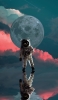 📱月と宇宙飛行士 iPhone 14 Pro 壁紙・待ち受け