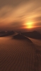 📱美しい砂漠と夕焼け iPhone 14 Plus 壁紙・待ち受け