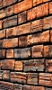 📱木のレンガ造りの壁 Xperia 5 IV 壁紙・待ち受け
