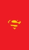 📱赤の背景 スーパーマンのロゴ iPhone 14 Plus 壁紙・待ち受け