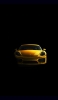 📱黄色いスポーツカー 黒の背景 iPhone 14 Pro Max 壁紙・待ち受け