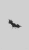 📱かっこいい黒のバットマンのロゴ 灰色の背景 iPhone 14 Pro 壁紙・待ち受け