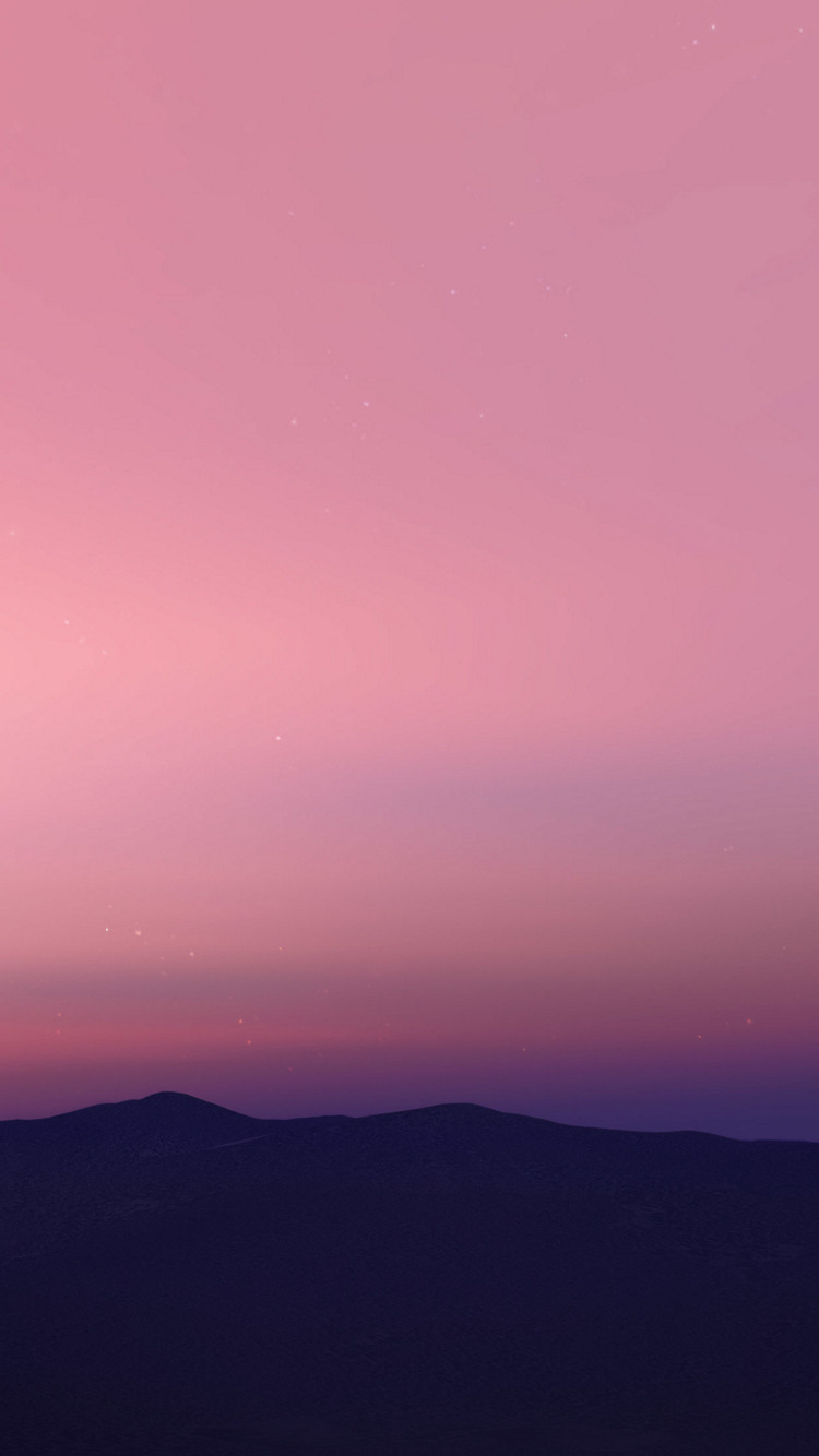 朝焼け時のピンクの空と山のシルエット Iphone Se 第2世代 スマホ壁紙 待ち受け スマラン