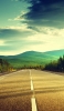 📱Sunny road, green mountains and blue sky iPhone 12 mini 壁紙・待ち受け