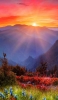 📱夕焼けと山脈と草原 OPPO Reno A Android 壁紙・待ち受け