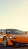 📱A cool orange sports car parked on the road ZenFone 6 Android 壁紙・待ち受け