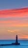 📱赤く染まる空 飛行機雲 海と灯台 Galaxy A30 Android 壁紙・待ち受け