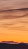 📱夕焼け 綺麗なオレンジの空 山 Libero 5G 壁紙・待ち受け