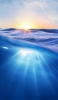 📱綺麗な青い海と太陽 iPhone 11 Pro 壁紙・待ち受け