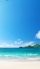 📱真夏の青空と海と白い砂浜 iPhone 12 壁紙・待ち受け