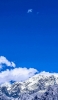📱白い雪山と青空と白い雲 iPhone 13 Pro 壁紙・待ち受け