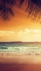 📱オレンジ色の綺麗な夕焼けと砂浜 iPhone 5 壁紙・待ち受け