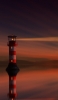 📱赤い灯台と海 iPhone SE (第3世代) 壁紙・待ち受け