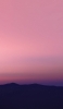 📱淡いピンク色の空と山 iPhone 6 壁紙・待ち受け