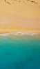 📱俯瞰視点のエメラルドグリーンの海と砂浜 iPhone SE (第3世代) 壁紙・待ち受け