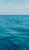 📱水色の海と遠くに見える船 iPhone 6 壁紙・待ち受け