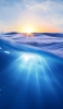 📱太陽と海の断面 iPhone 6 壁紙・待ち受け