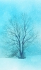 📱雪が降り積もる景色 水色 大きな枯れ木 iPhone SE (第3世代) 壁紙・待ち受け