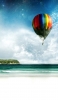 📱海岸沿いを飛ぶ気球 iPhone XR 壁紙・待ち受け