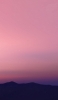 📱山のシルエット ピンクの空 iPhone XR 壁紙・待ち受け