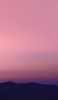 📱淡いピンクの空と山のシルエット OPPO A5 2020 壁紙・待ち受け
