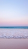 📱朝の海辺 淡い色合いの空 iPhone 12 mini 壁紙・待ち受け