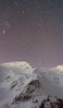 📱黒い星空と綺麗な雪山 AQUOS R2 compact 壁紙・待ち受け