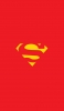 📱赤の背景 スーパーマンのロゴ iPhone 12 Pro 壁紙・待ち受け