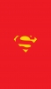 📱赤の背景 スーパーマンのロゴ iPhone 13 Pro Max 壁紙・待ち受け