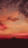 📱赤みがかった空と山のシルエット Redmi Note 9S 壁紙・待ち受け