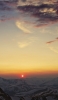 📱赤い太陽と広がる雪山 ZenFone 7 Pro 壁紙・待ち受け