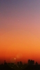 📱夕暮れ オレンジの空 都会 ZenFone 7 壁紙・待ち受け