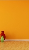 📱黄色い壁の部屋 赤・オレンジ・緑の壺 moto g9 play 壁紙・待ち受け