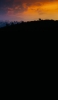 📱夕陽 山頂から麓を見下ろす戦士 渡り鳥 iPhone 6 壁紙・待ち受け